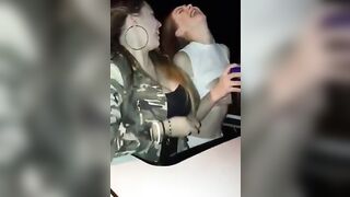 Two girls ride roller coaster and show their tits