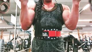 Jaqueline Fuchs pumping her huge biceps - Female Bodybuilders
