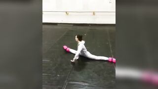 a weirdly limber ballerina warming up