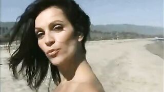 Denise Milani: Blowing A Kiss At The Beach