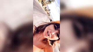 Drunk: Riley Reid recording herself driving a toy car down a residential street in the midst of the day absolutely naked