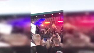 rod engulfing at rock concert