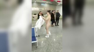 Woman Undressed Herself And Protested At An Airport, After Gate Agents Had Told Her That She Couldn't Fly Without An Air Ticket - Drunken