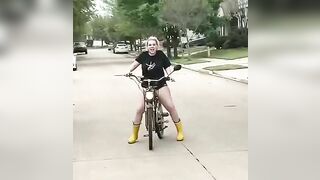 drive-by booty shake. Large booty swerving on a bike