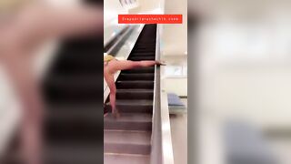 squirt and masturbation on an escalator