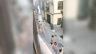 a CROWD OF UNDRESSED WOMEN in Valencia
