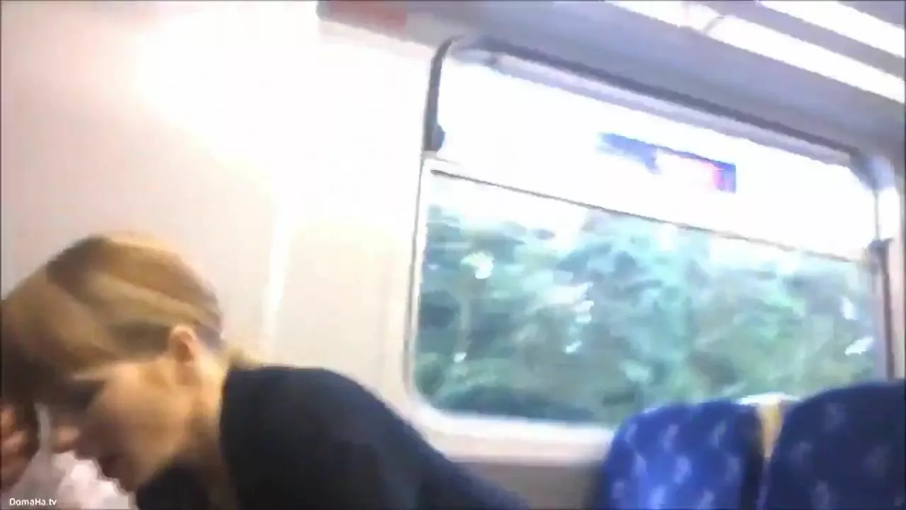 Exhibitionist Sex Sexy mature blows dude on a train photo