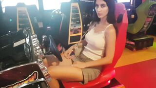 The Girl without Panties Plays in the Game Play Center - Exposed in Public