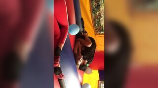 Behind the Scenes: Pornstar Nikki Hearts Making Out and Fingering Gal In Bouncy Castle